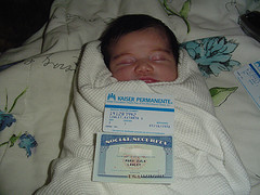Picture of baby with their social security card
